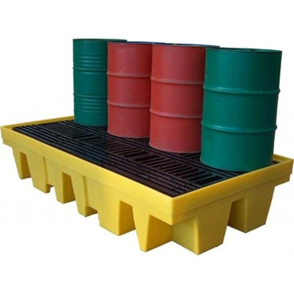 Two green and two red barrels on top of yellow and black platform